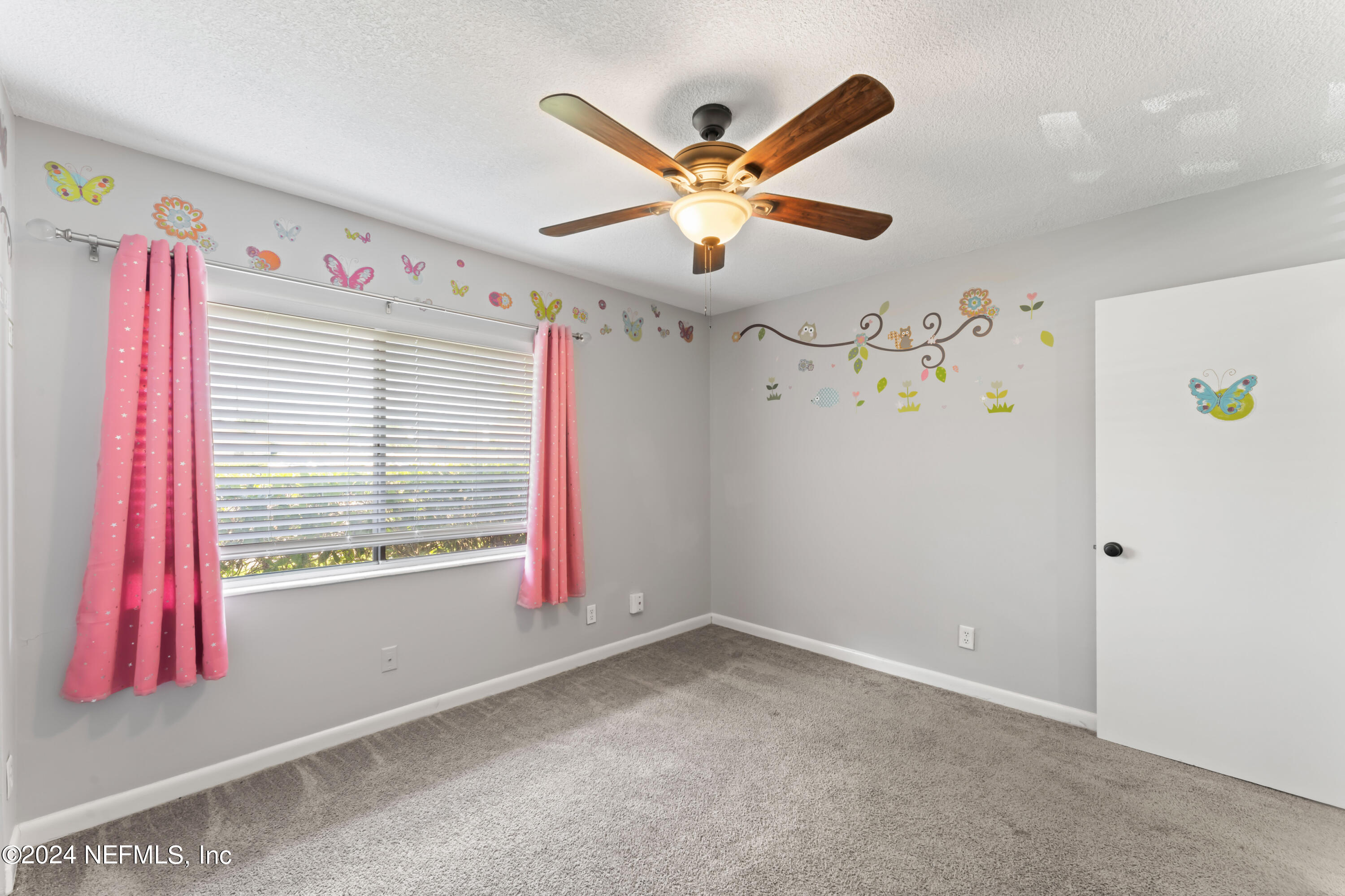 1283 The Grove Road Orange Park, FL 32073 - Photo 28 of 49 a view of room with window and ceiling fan