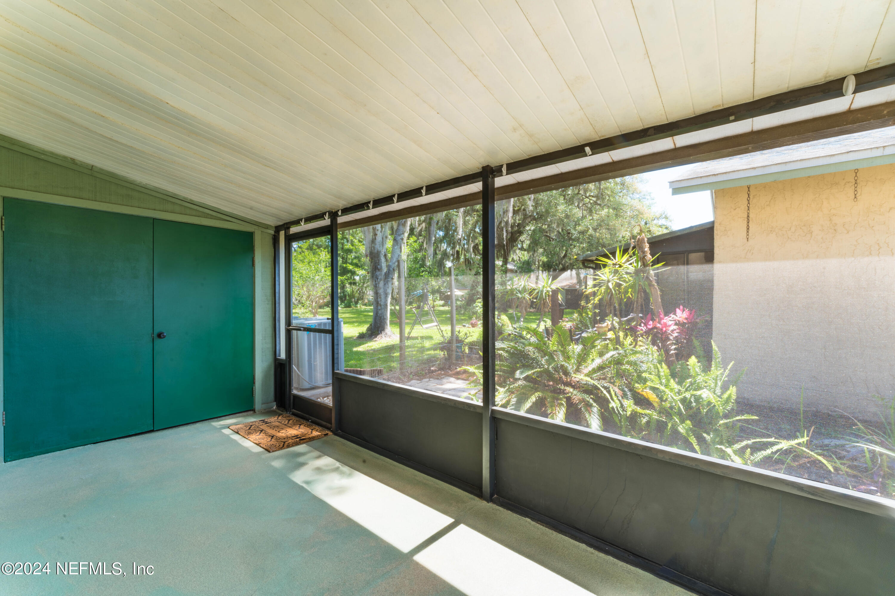 1283 The Grove Road Orange Park, FL 32073 - Photo 34 of 49 a living room with a large window