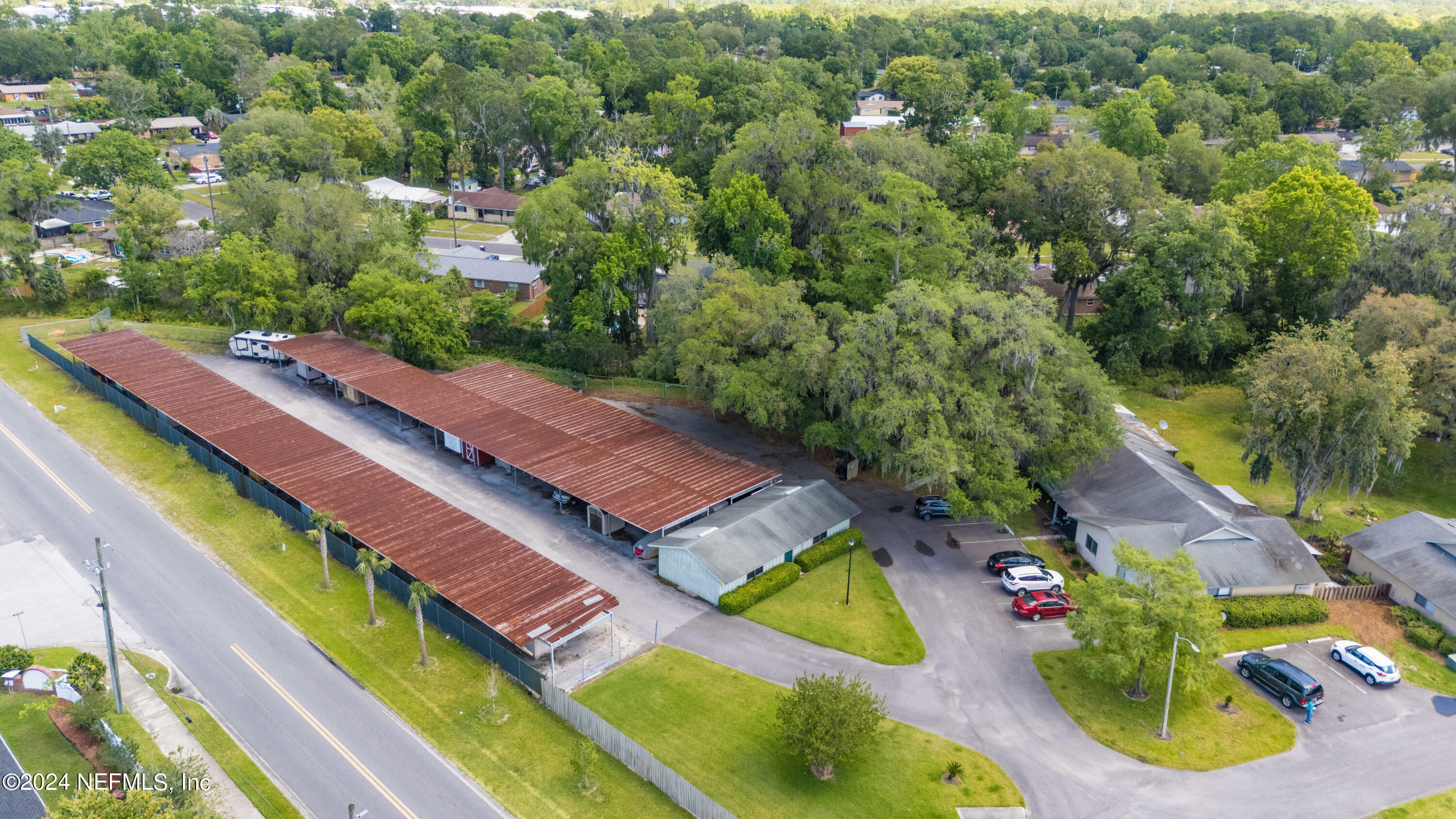 1283 The Grove Road Orange Park, FL 32073 - Photo 39 of 49 an aerial view of a house with a garden and swimming pool