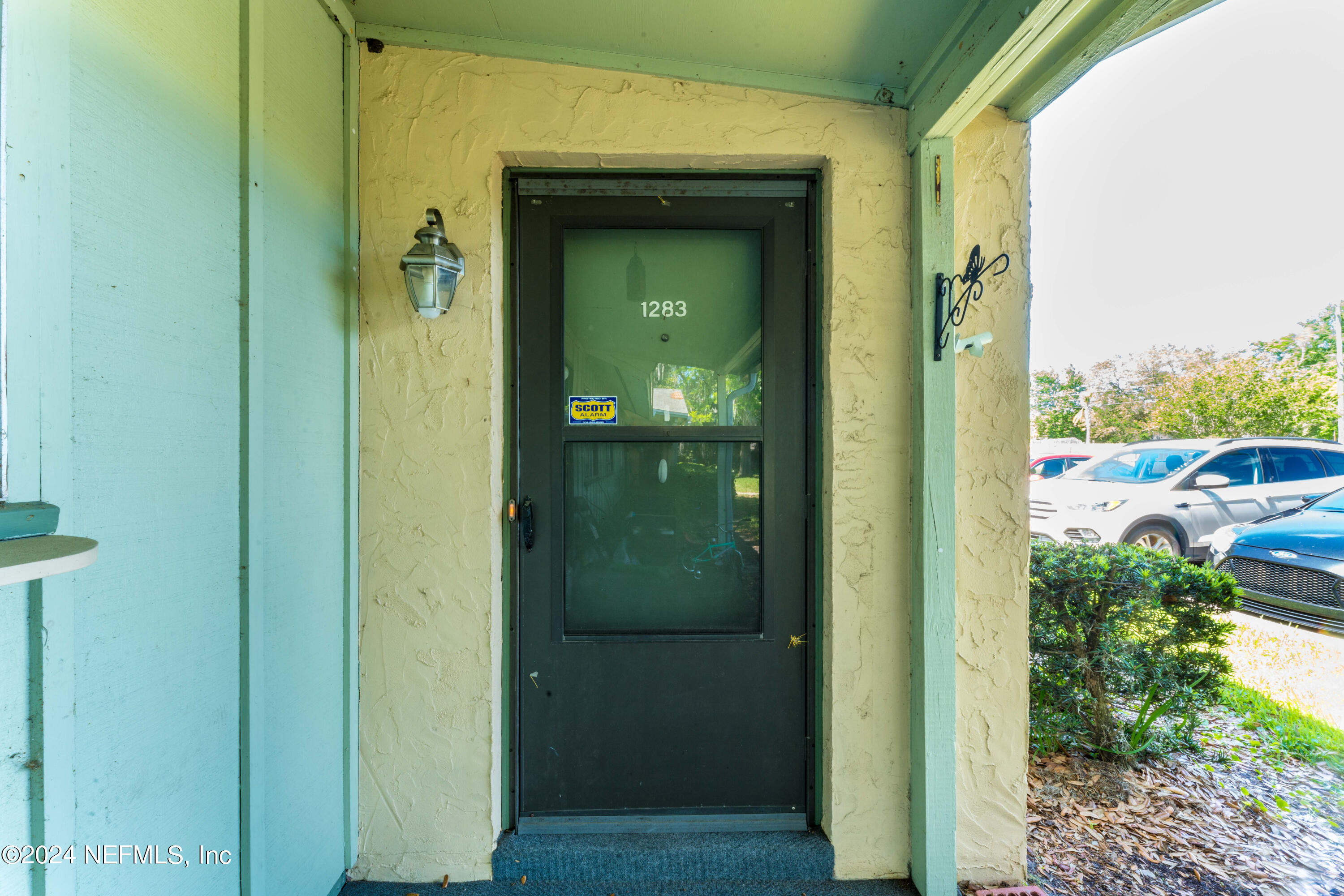1283 The Grove Road Orange Park, FL 32073 - Photo 4 of 49 a view of a bathroom from a hallway