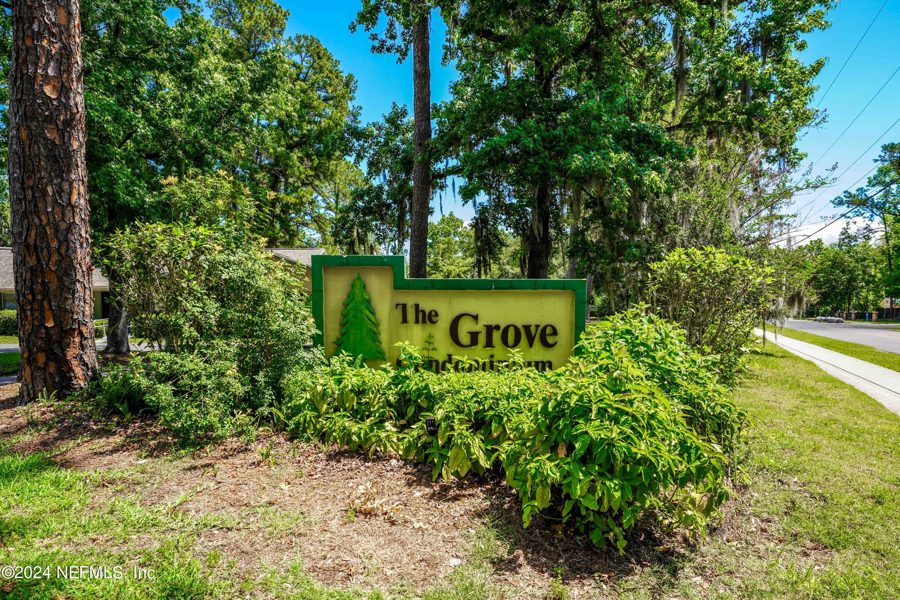 1283 The Grove Road Orange Park, FL 32073 - Photo 47 of 49 a view of a garden with large trees