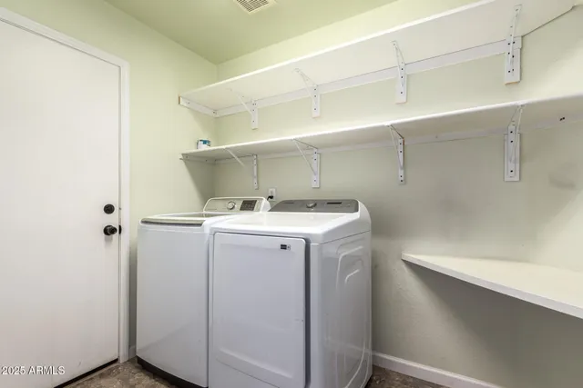 a house with trees in the background