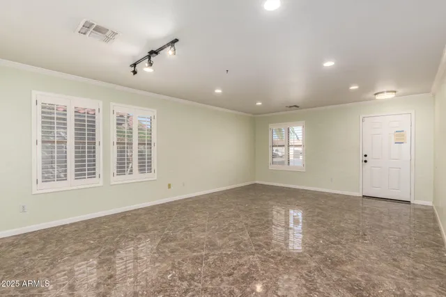 a view of a kitchen with a sink and a stove