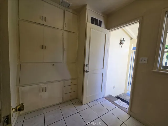a bathroom with a shower and a sink