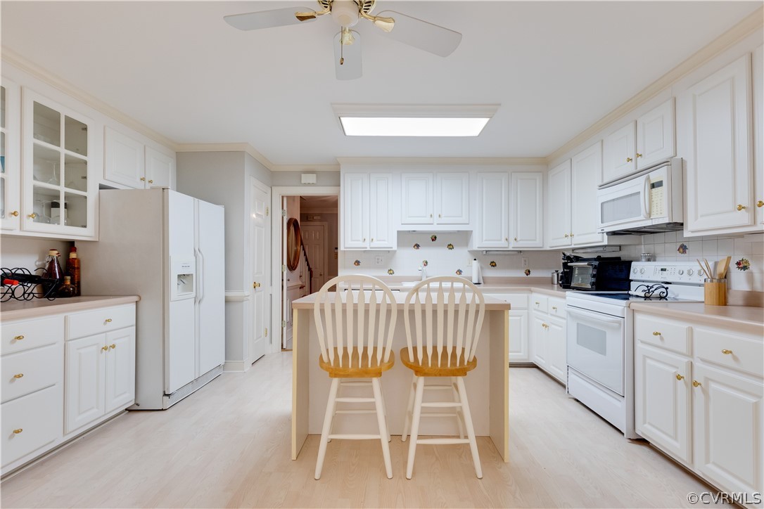 2221 Castlebridge Road Midlothian, VA 23113 - Photo 12 of 37 Light and bright eat-in kitchen with TWO pantries!