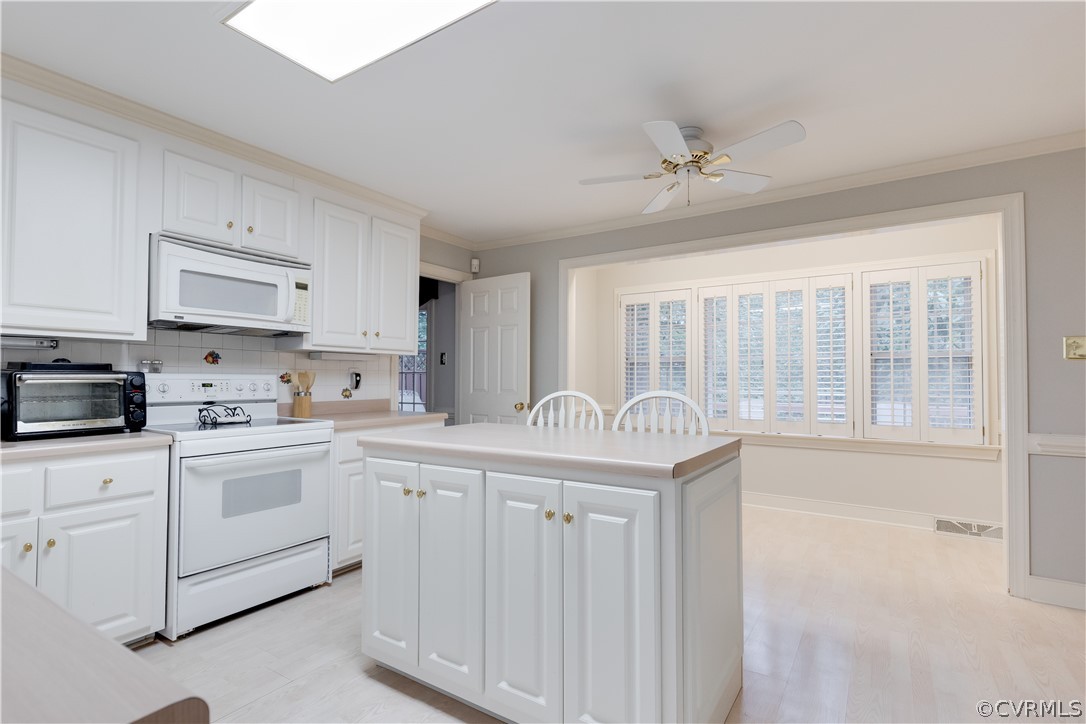 2221 Castlebridge Road Midlothian, VA 23113 - Photo 15 of 37 View to breakfast nook/eat-in area overlooking bac