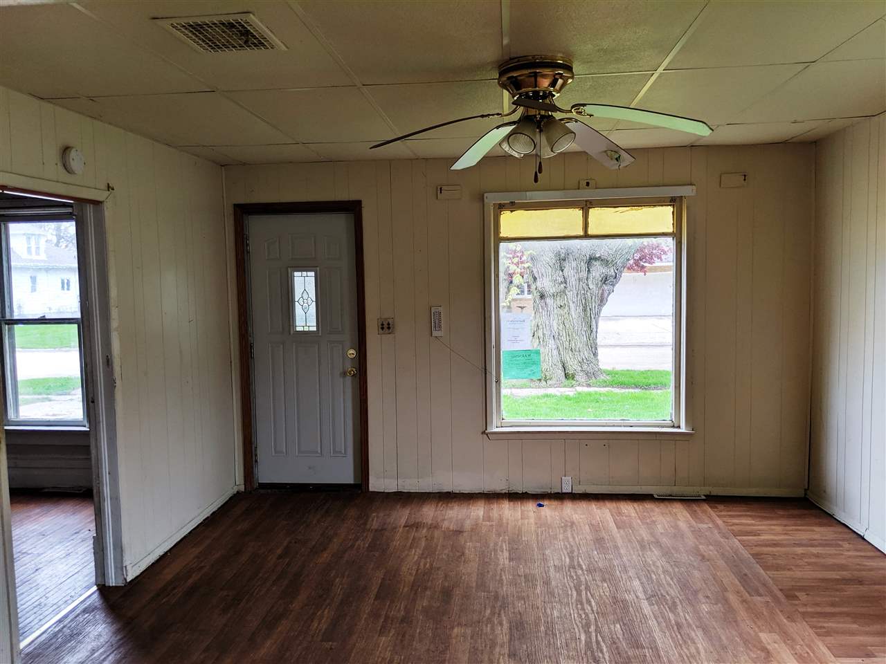 310 South Ridge Street Shannon, IL 61078 - Photo 2 of 15 a view of an empty room and window