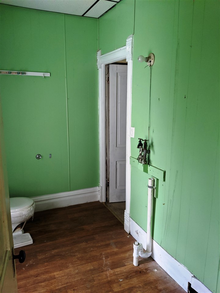 310 South Ridge Street Shannon, IL 61078 - Photo 9 of 15 a view of an entryway with wooden floor