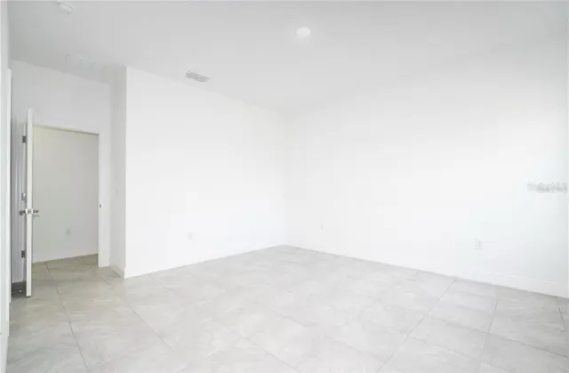 a bathroom with a bathtub and toilet