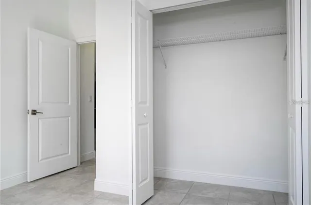 a view of a room that has a window in it