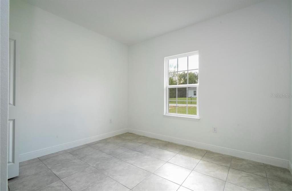 9809 North Swanee Terrace Citrus Springs, FL 34433 - Photo 42 of 46 a view of a room that has a window in it