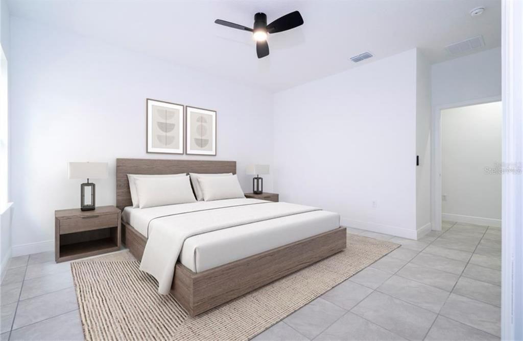 9809 North Swanee Terrace Citrus Springs, FL 34433 - Photo 6 of 46 a bedroom with a bed and cabinets