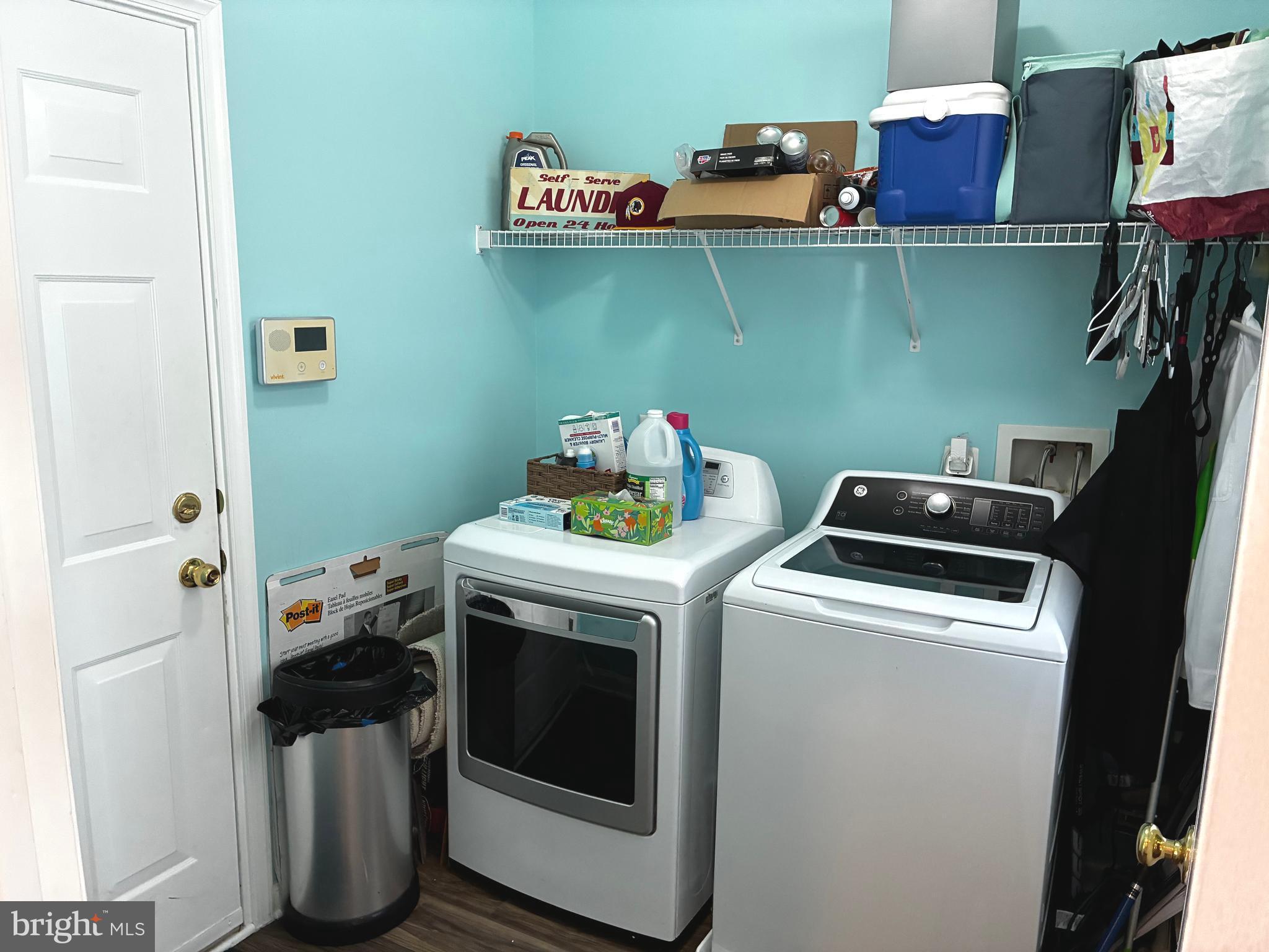 14301 Lightfoot Street Accokeek, MD 20607 - Photo 13 of 32 a utility room with dryer and washer