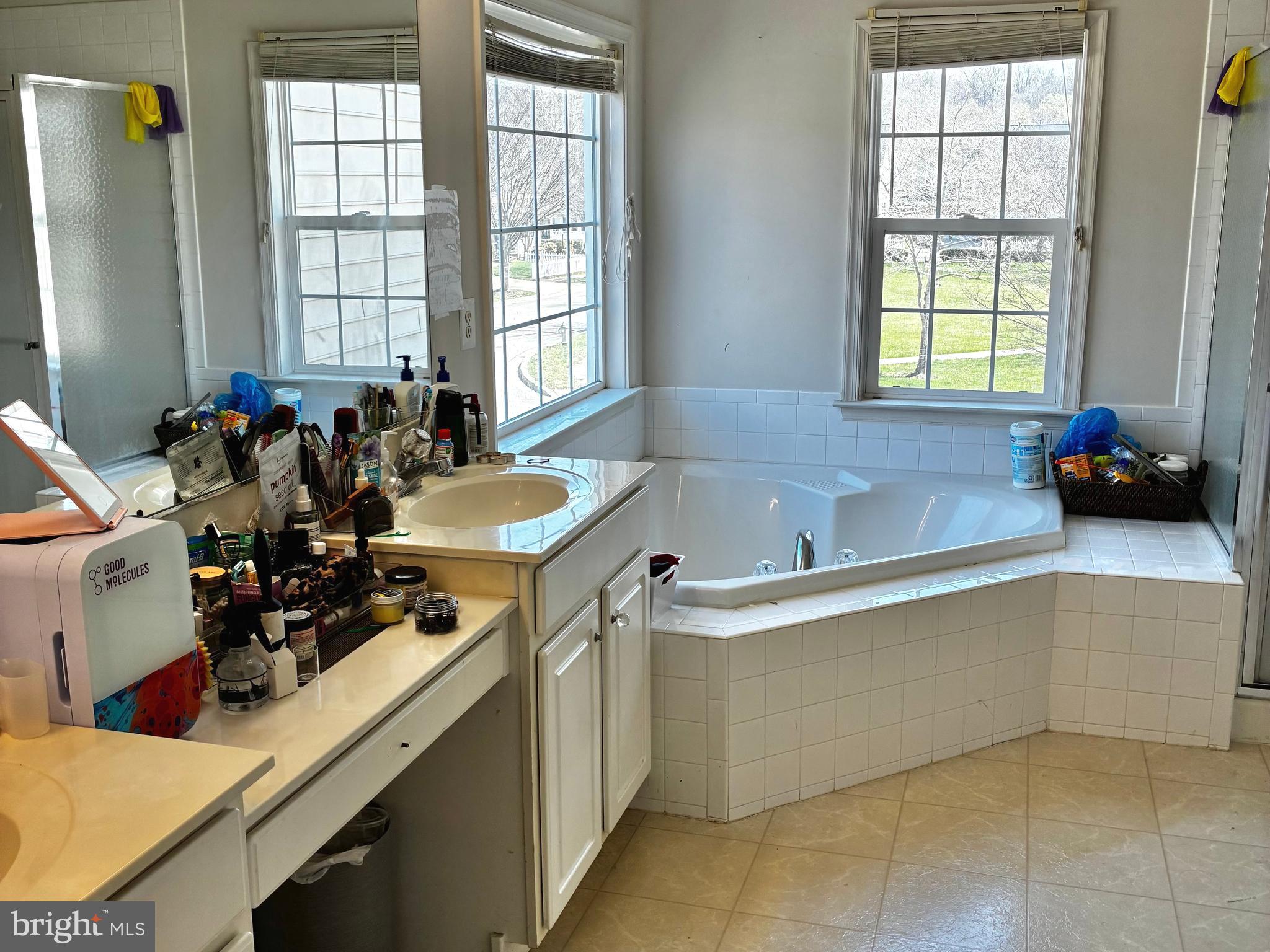 14301 Lightfoot Street Accokeek, MD 20607 - Photo 17 of 32 a kitchen with a sink stove and window