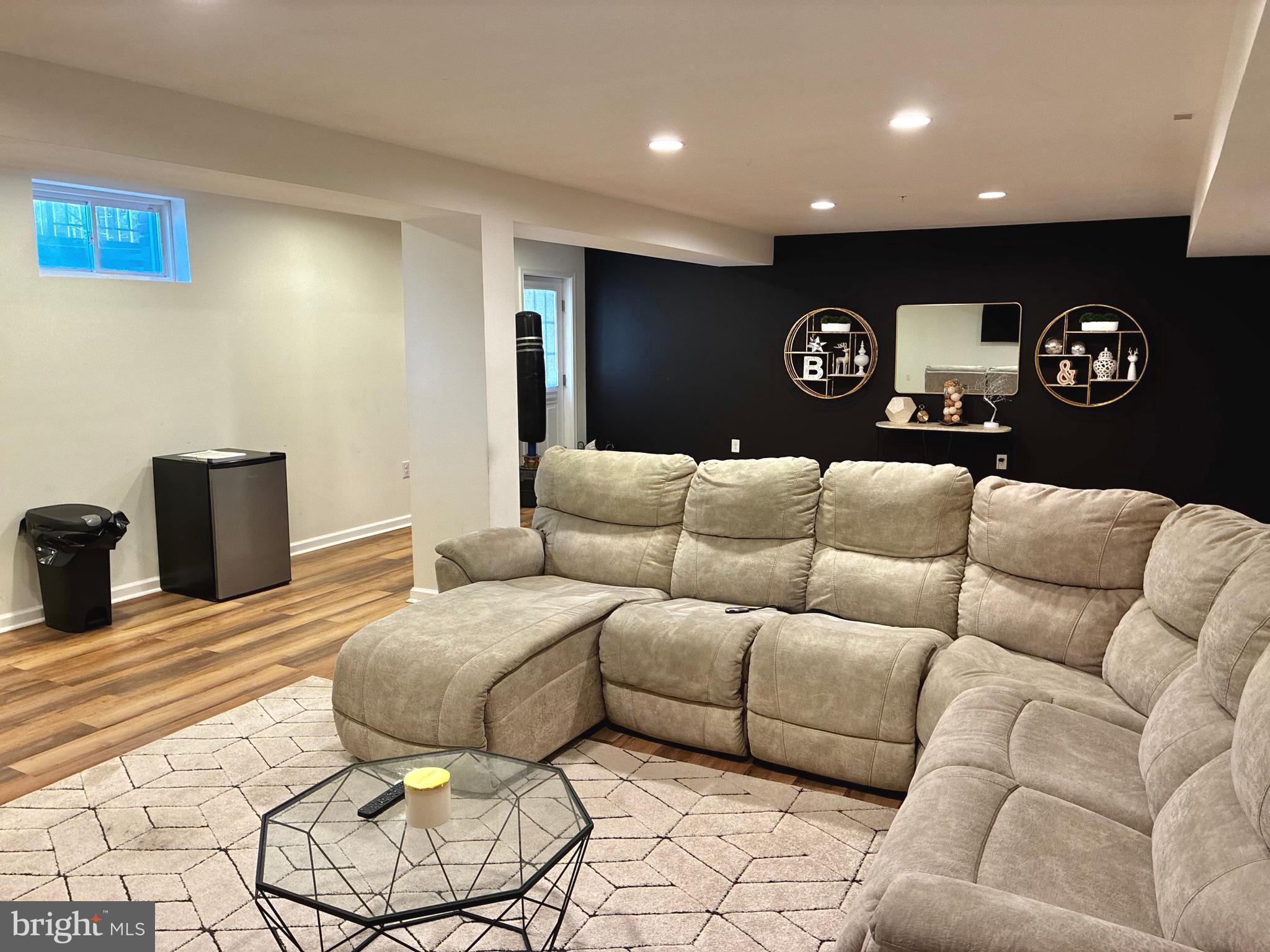 14301 Lightfoot Street Accokeek, MD 20607 - Photo 26 of 32 a living room with furniture