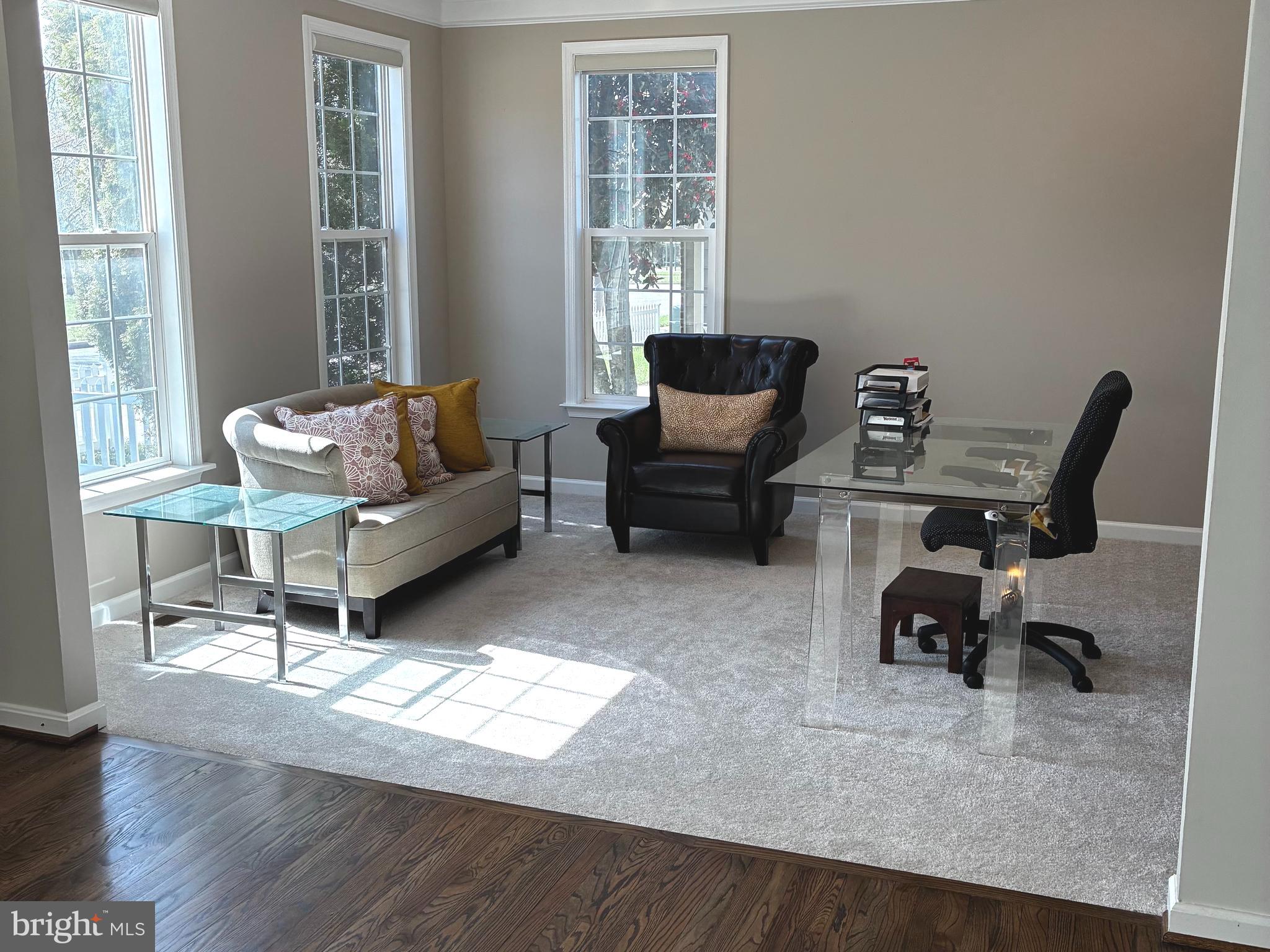 14301 Lightfoot Street Accokeek, MD 20607 - Photo 4 of 32 a living room with furniture and a window