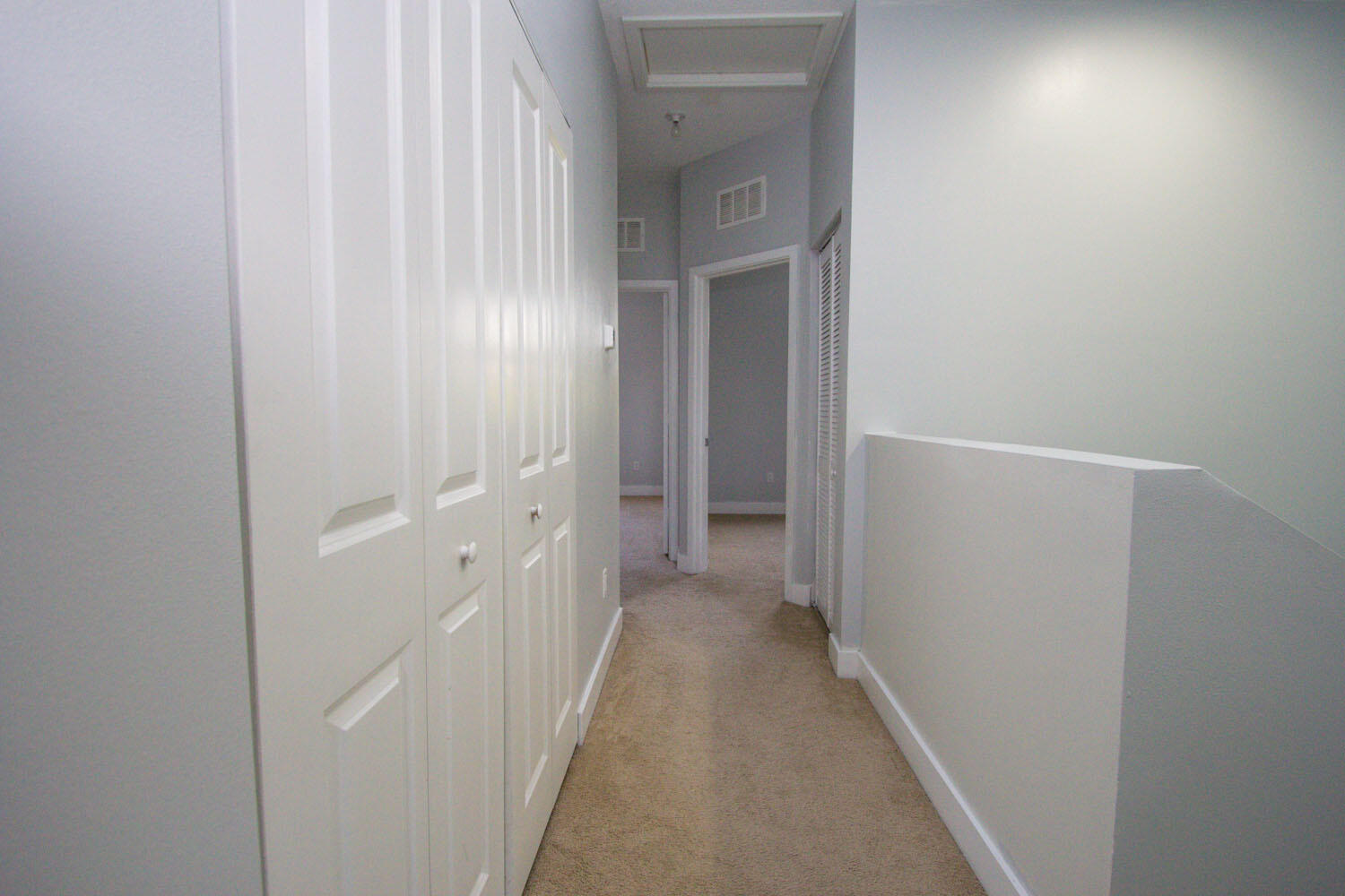 6022 Pine Tree Way Riviera Beach, FL 33410 - Photo 14 of 18 Upstairs Hallway