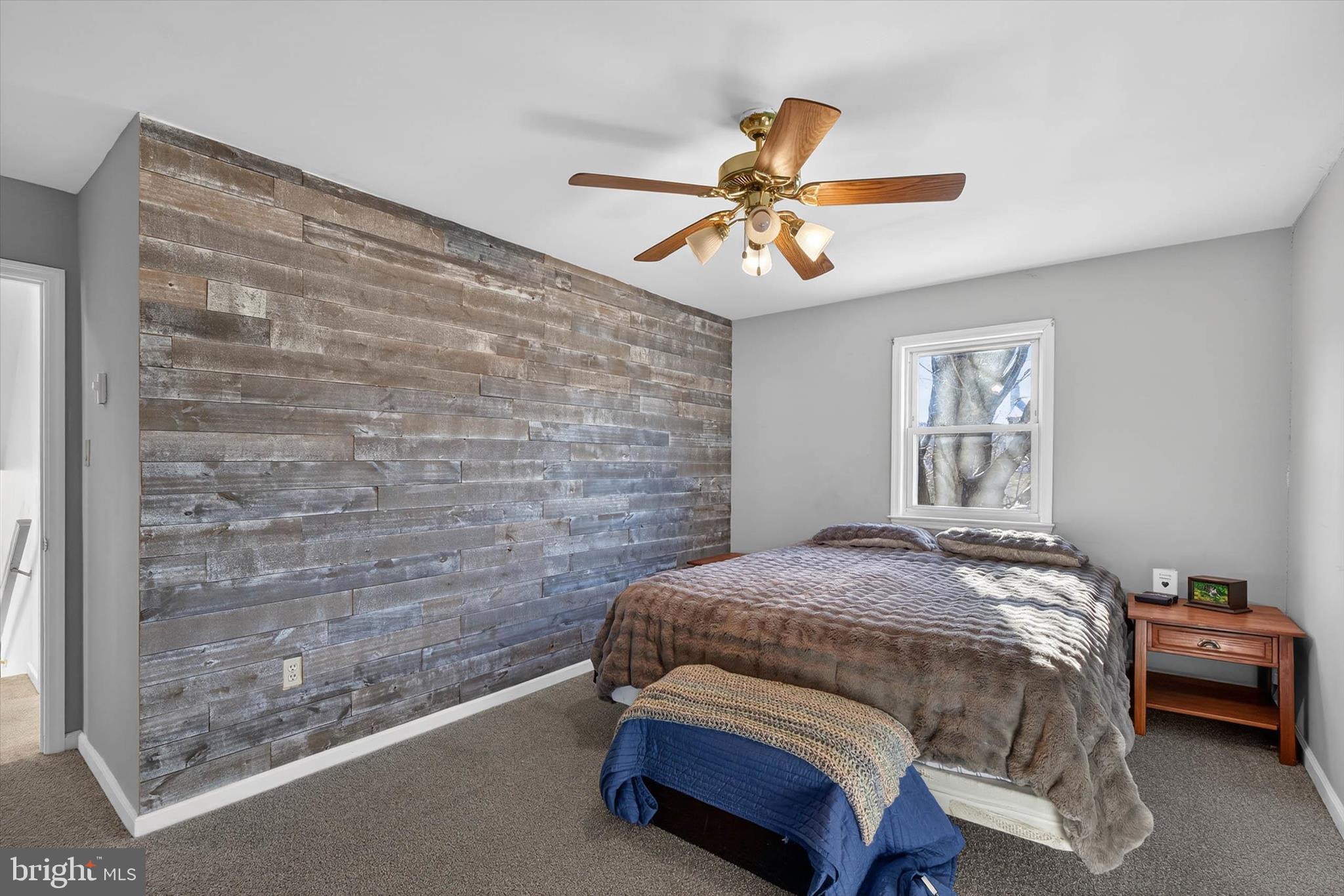 27 Rosemont Avenue Reading, PA 19607 - Photo 14 of 54 a bedroom with a bed and a chandelier