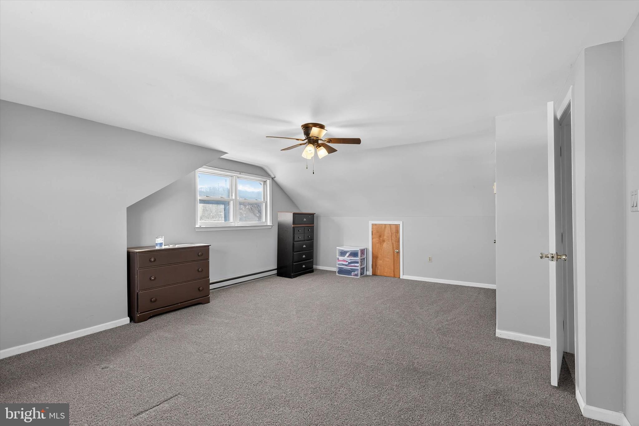 27 Rosemont Avenue Reading, PA 19607 - Photo 19 of 54 an empty room with windows and ceiling fan