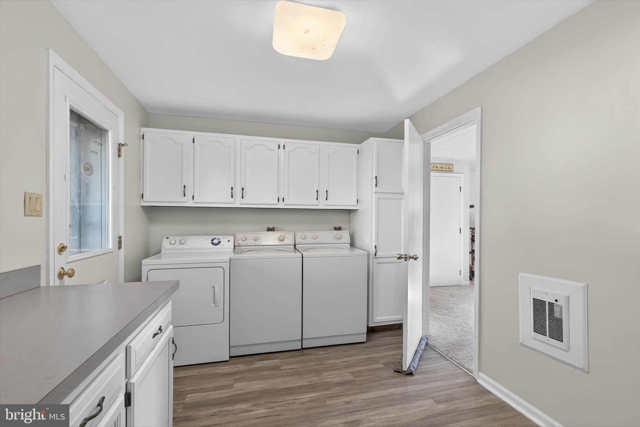 27 Rosemont Avenue Reading, PA 19607 - Photo 30 of 54 a room with a sink cabinets and wooden floor