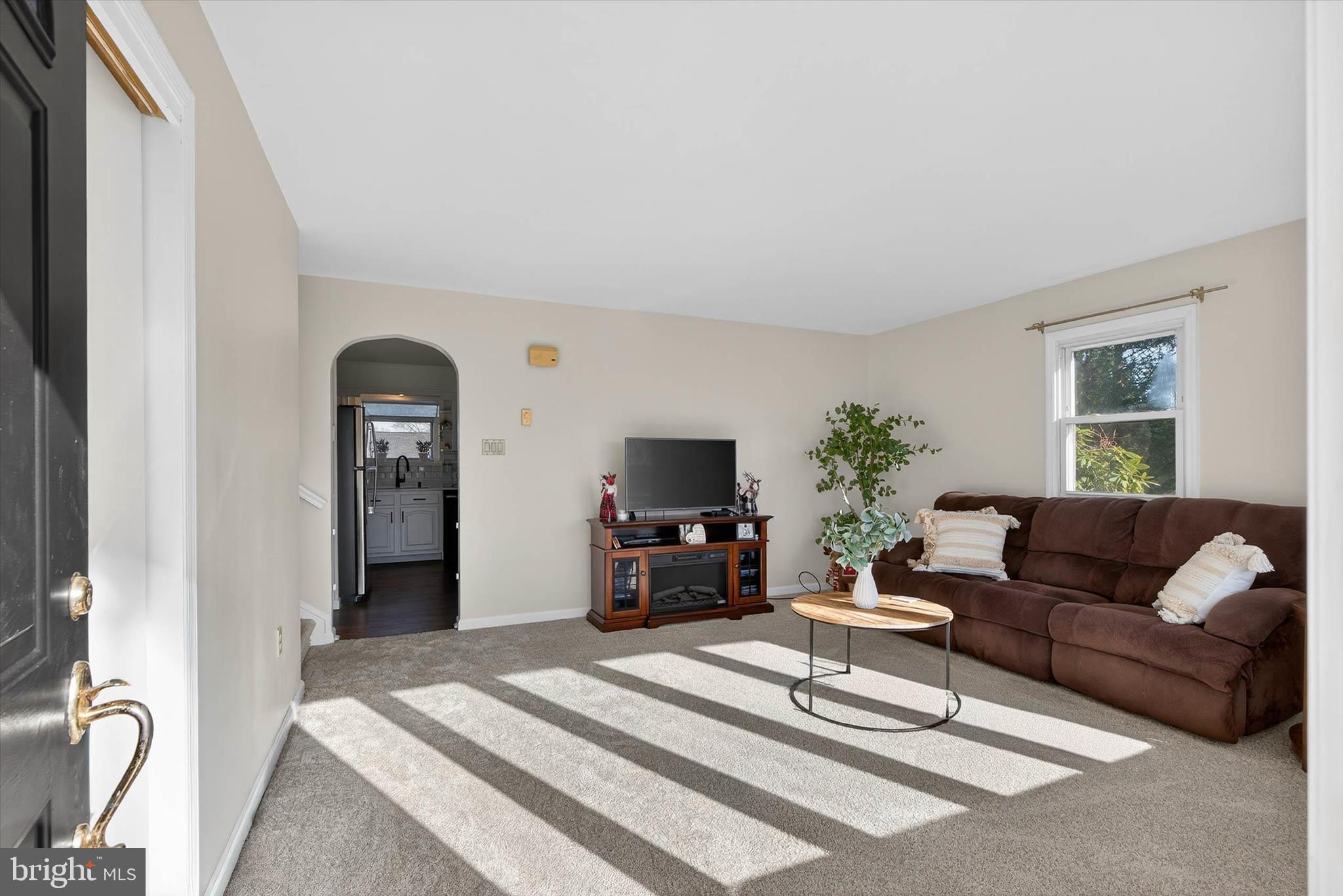 27 Rosemont Avenue Reading, PA 19607 - Photo 3 of 54 a living room with furniture a fireplace and a flat screen tv
