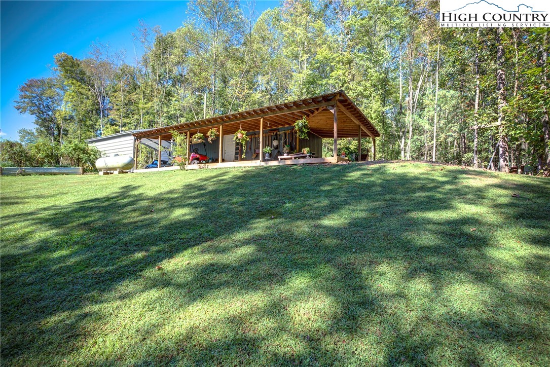 3460 South Center Church Road Thurmond, NC 28683 - Photo 48 of 50 a house view with a garden