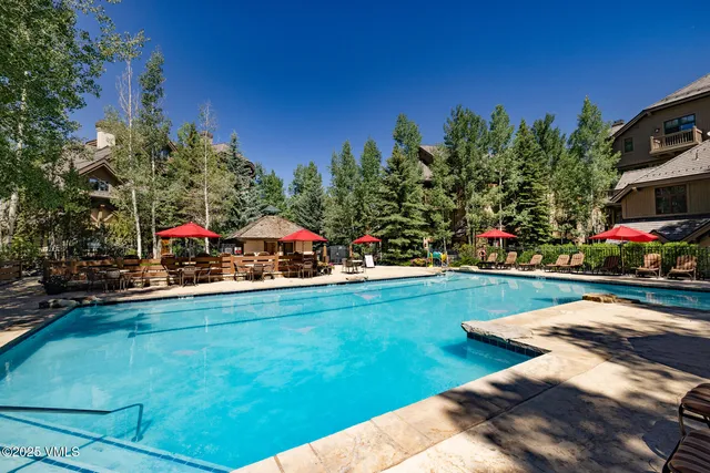 a view of a house with swimming pool