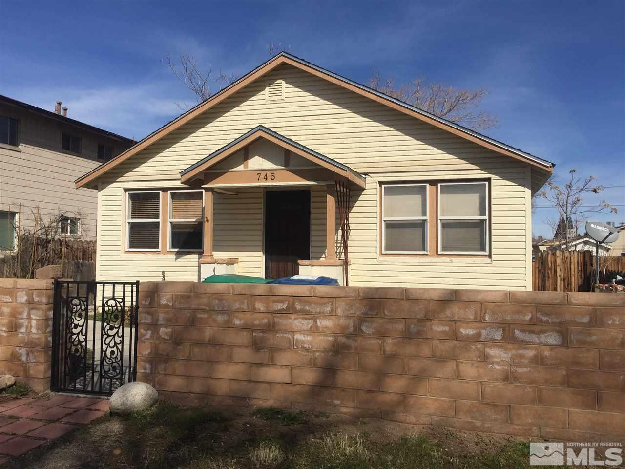 745 Aitken Street Reno, NV 89502 - Photo 1 of 1 a front view of a house with garage