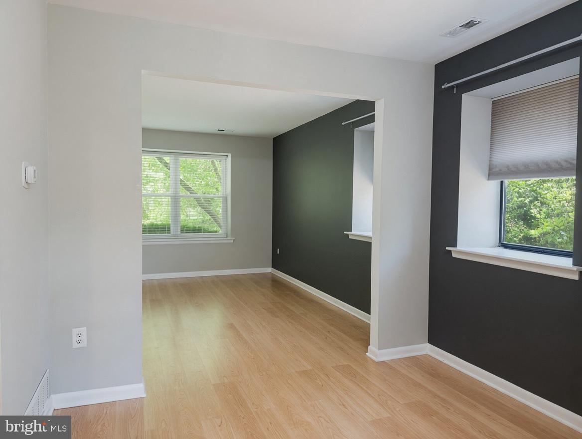 2 Goshawk Court Voorhees, NJ 08043 - Photo 6 of 33 an empty room with wooden floor closet and windows