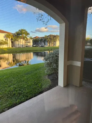 a view of a lake from a yard