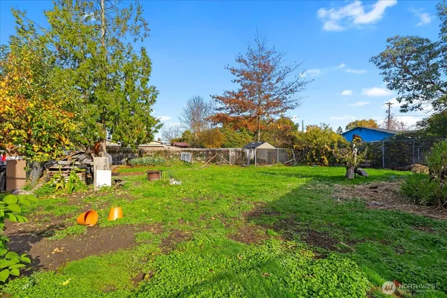 a picture of a bathroom with a shower