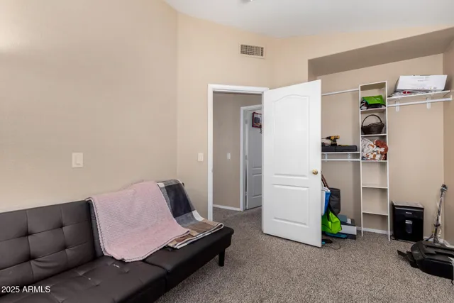 a living room with furniture and a couch