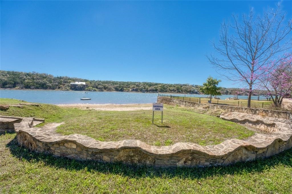 Tbd Spring Street Burnet, TX 78611 - Photo 13 of 17 a view of a lake with houses in the back