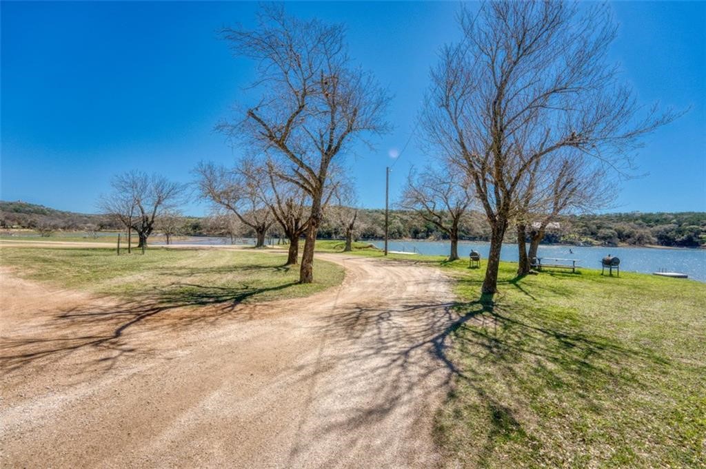 Tbd Spring Street Burnet, TX 78611 - Photo 14 of 17 a view of yard with tree in the background