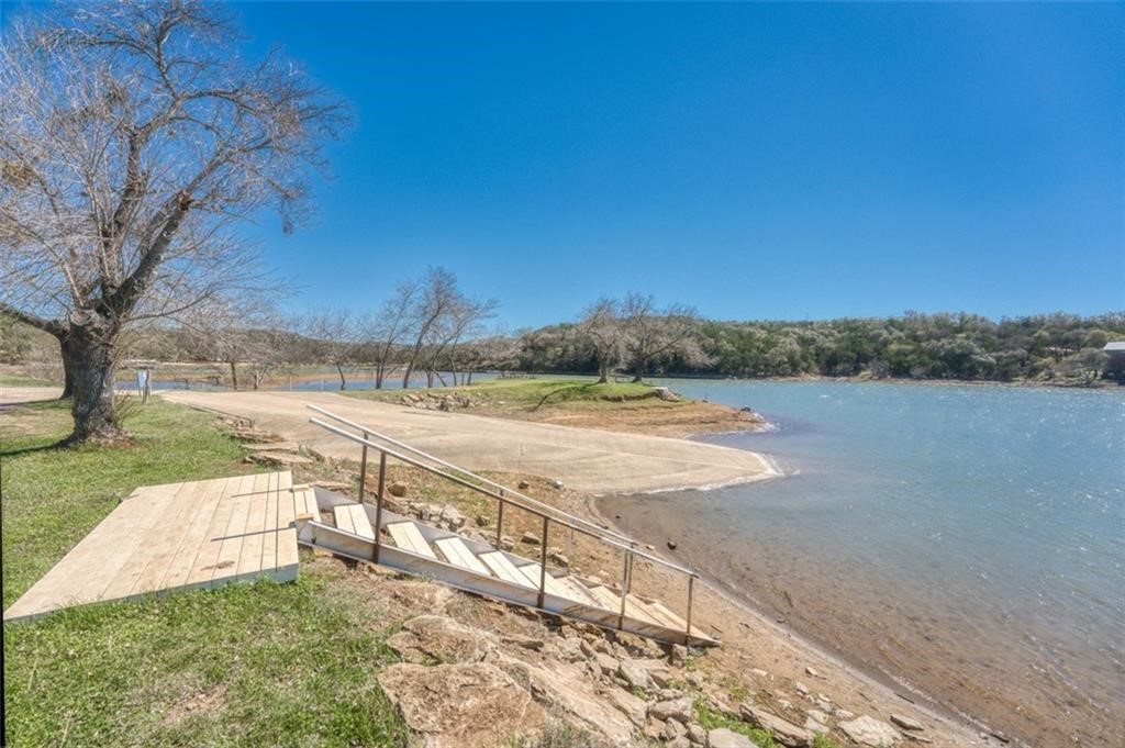 Tbd Spring Street Burnet, TX 78611 - Photo 10 of 17 a view of a lake with a yard