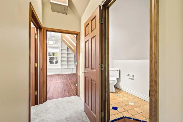 a bathroom with a toilet and a sink