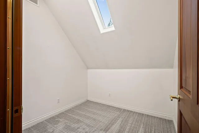 a view of a house with a street