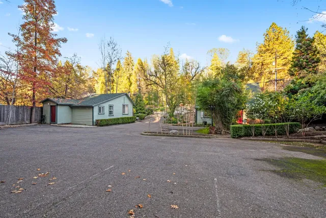 a view of a house with a street
