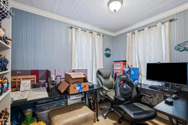 a kitchen that has a sink and a stove in it