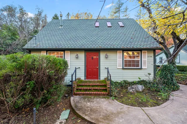 a view of a house with tree s