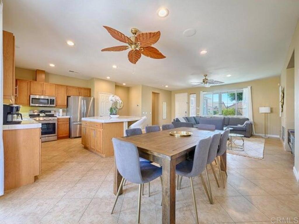 80596 Key Largo Avenue Indio, CA 92201 - Photo 3 of 59 a view of a dining area with furniture