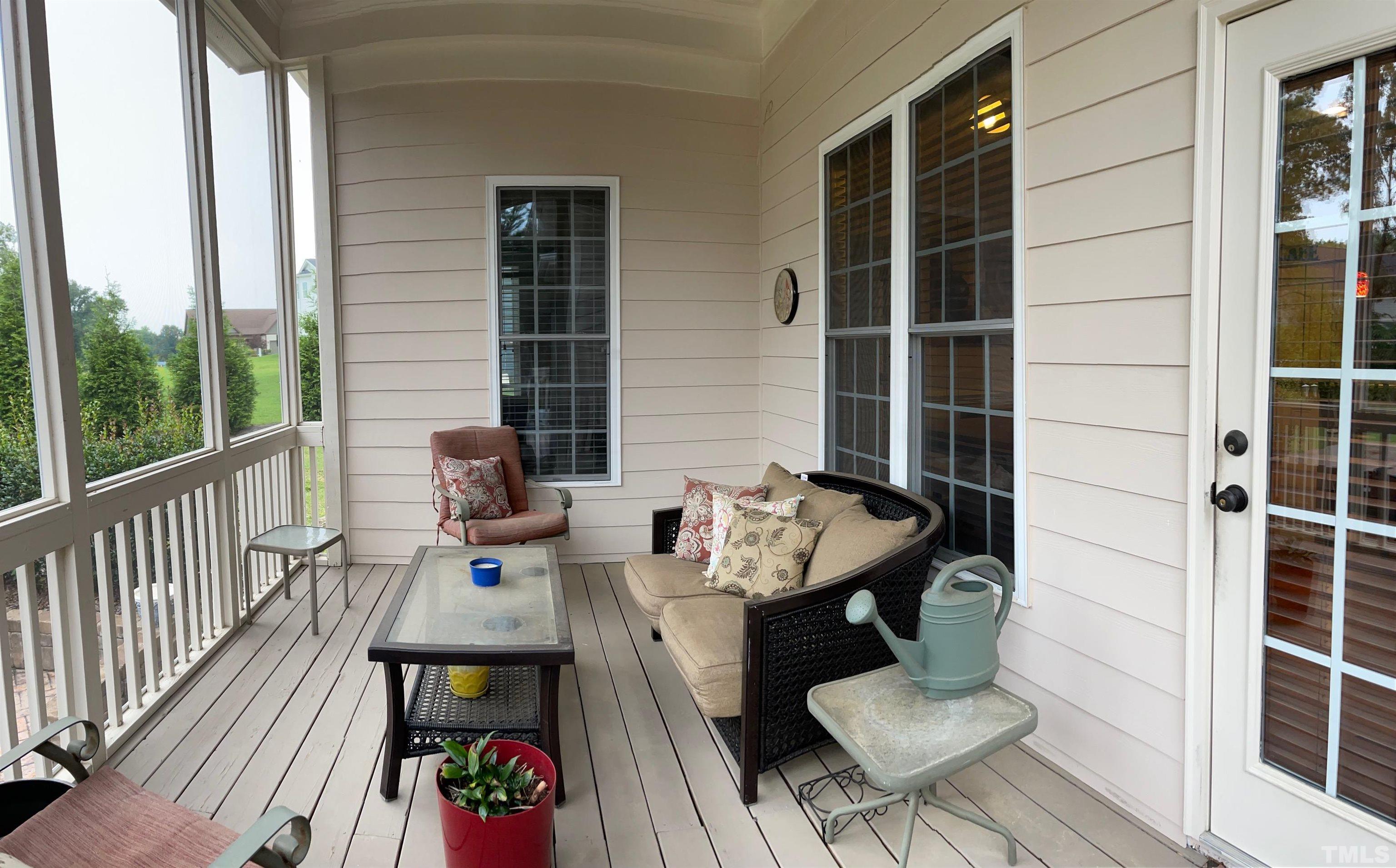 72 Silverside Drive Angier, NC 27501 - Photo 24 of 28 a balcony view with a seating space