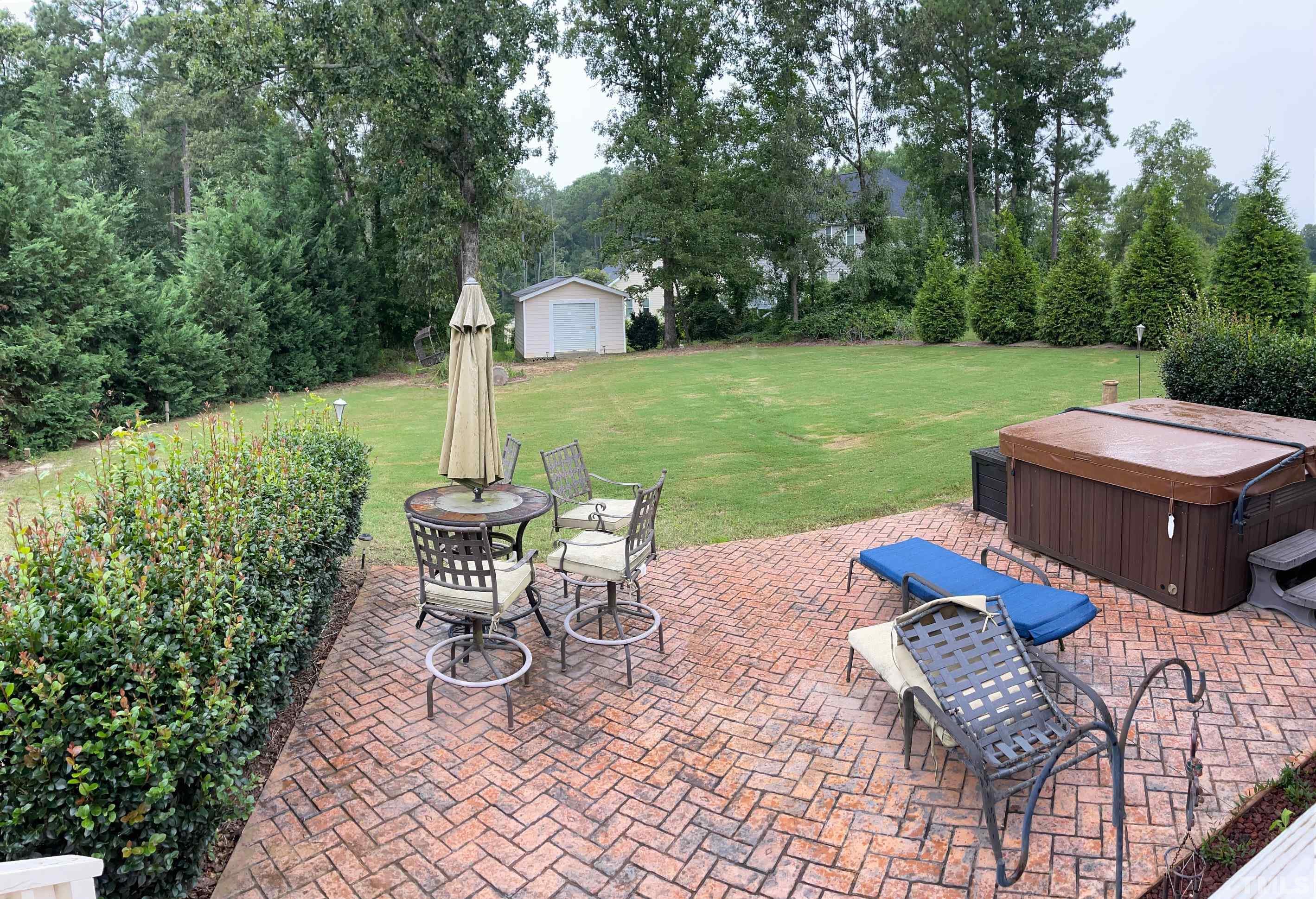 72 Silverside Drive Angier, NC 27501 - Photo 27 of 28 a view of a patio with garden