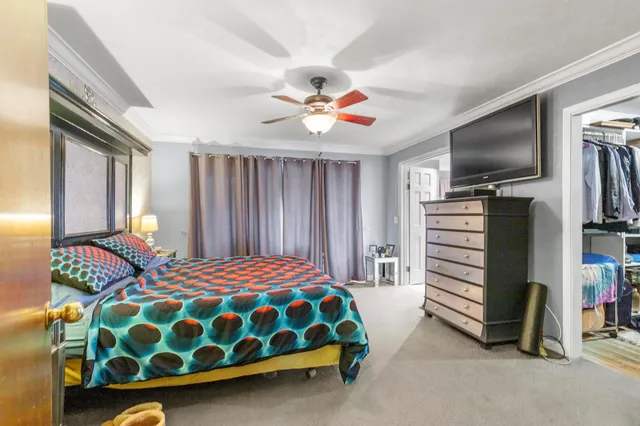 a spacious bathroom with a tub and shower