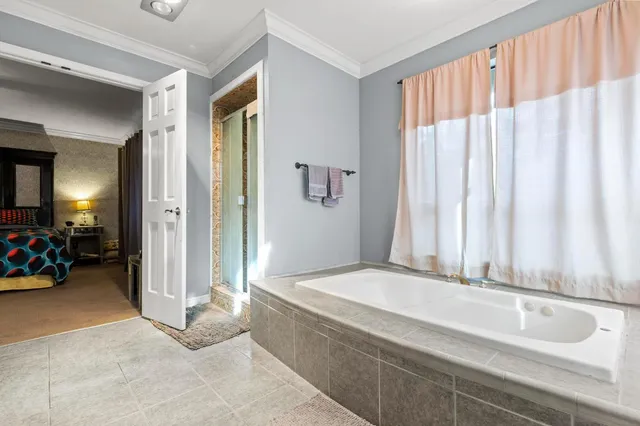 a view of a hallway with workspace and entryway