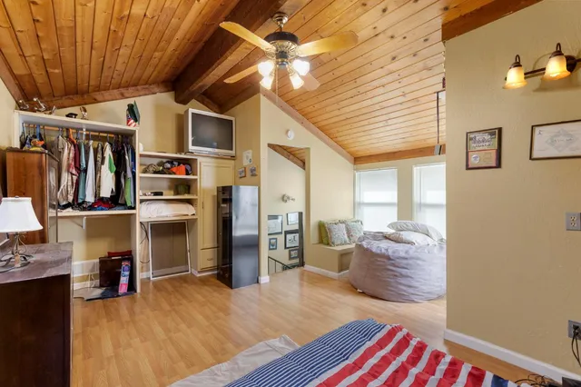 a view of tree and a yard