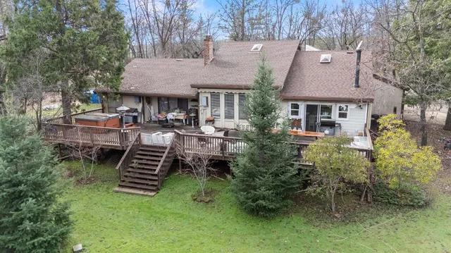 a view of roof deck with patio