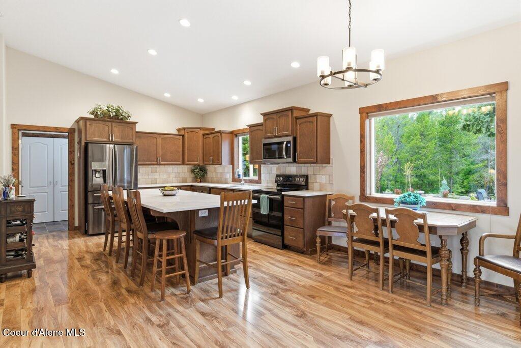 24414 North Wendler Loop Rathdrum, ID 83858 - Photo 7 of 48 Kitchen with island