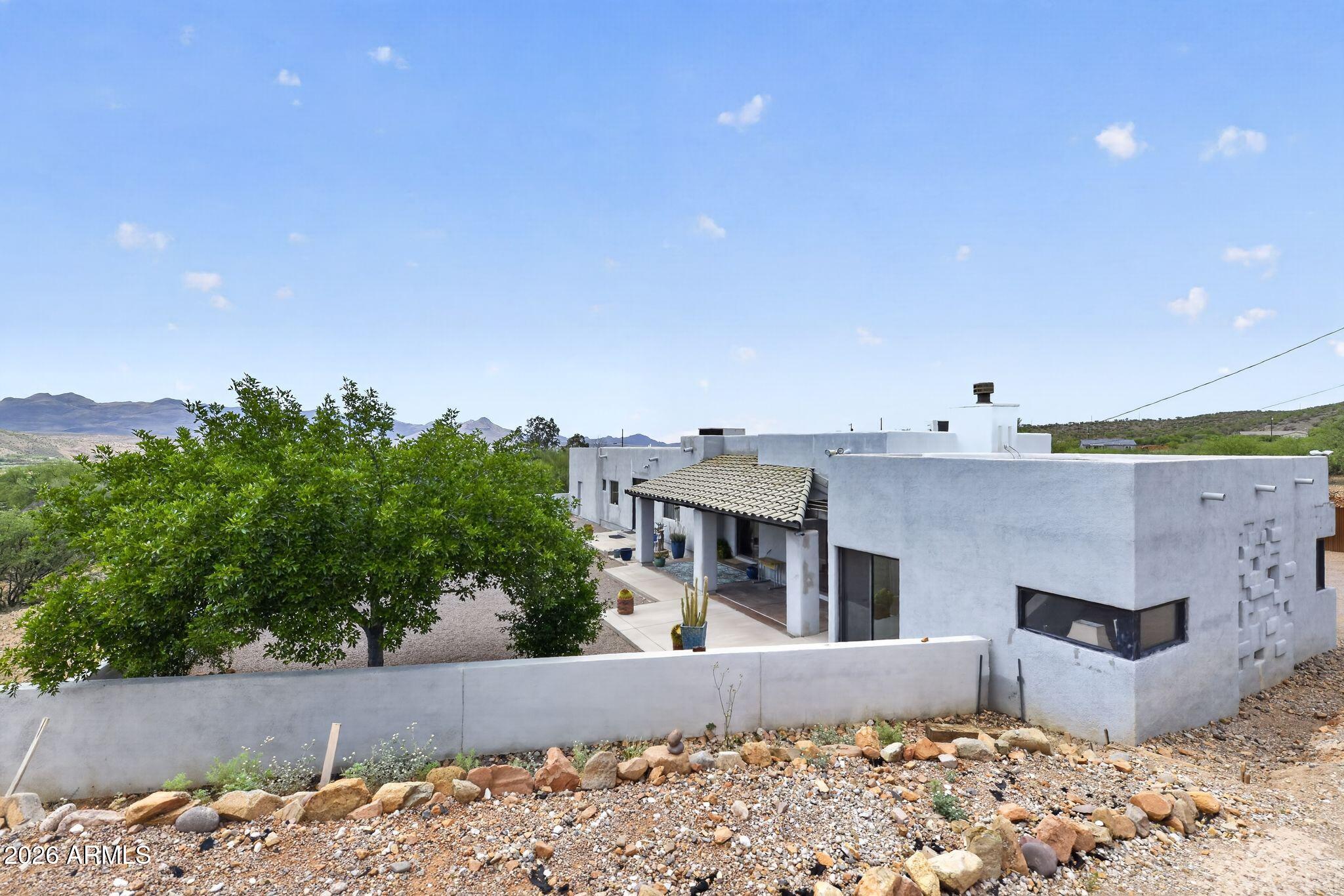 277 Círculo Silva Rio Rico, AZ 85648 - Photo 3 of 34 a building view with a outdoor space