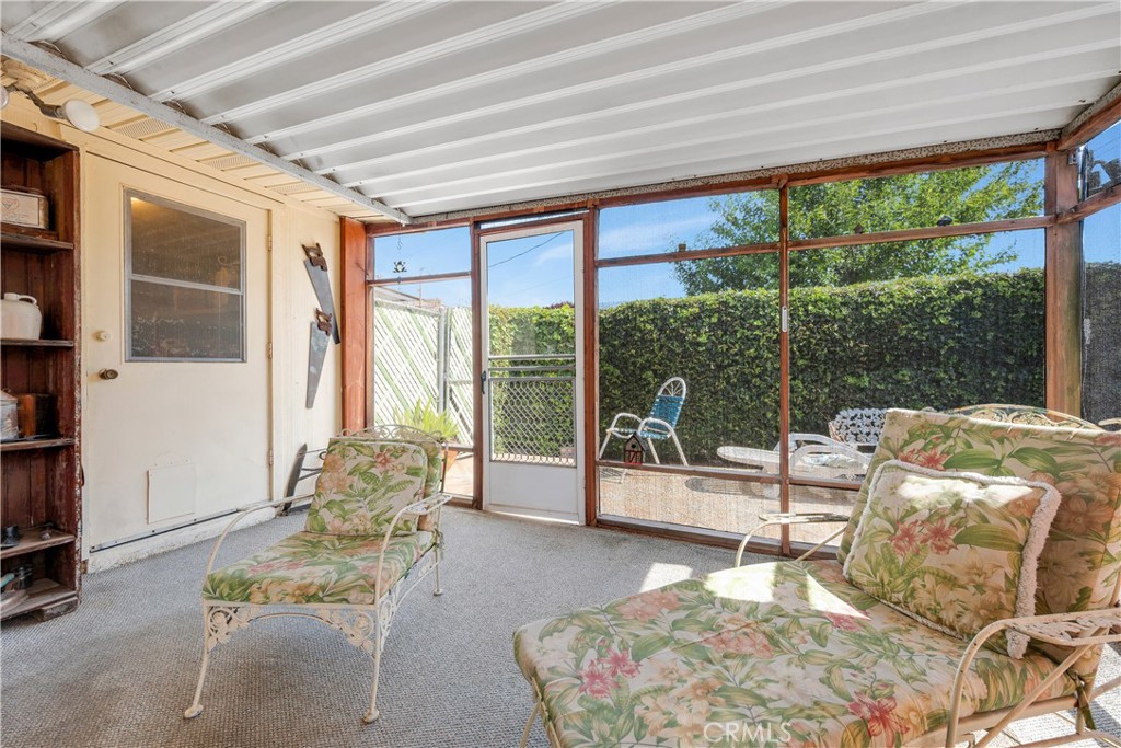 28839 Carmel Road Menifee, CA 92586 - Photo 25 of 47 a living room filled with furniture and a large window